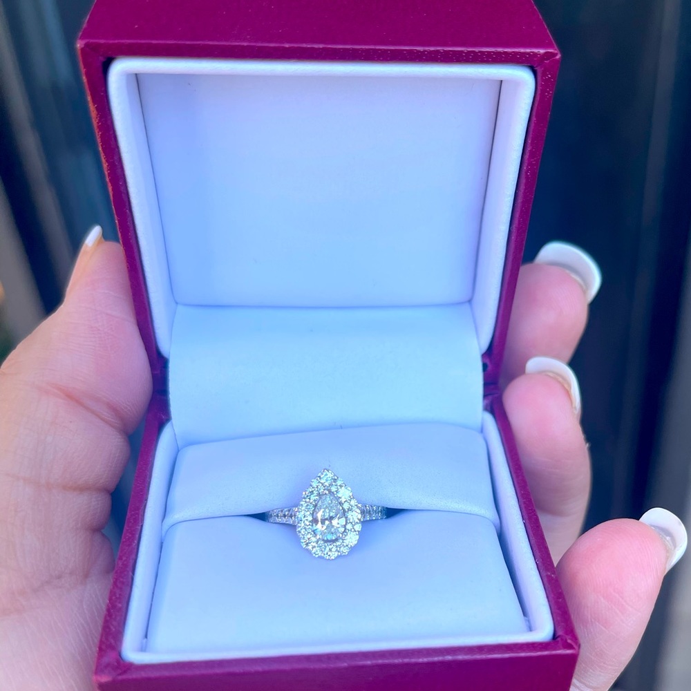 Real natural Diamond ring with certificate and receipt. Size 4.5